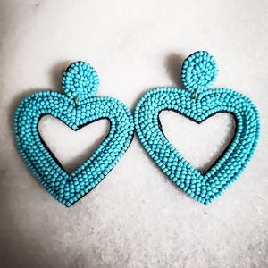 Heart-shaped beaded earrings sky blue